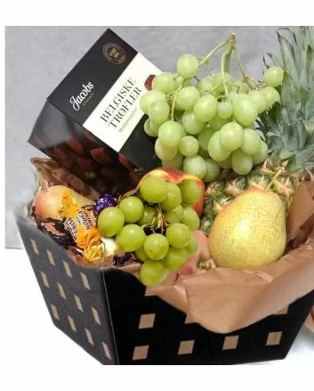 Gourmet gavekurv med friske frukter og belgiske trøfler perfekt for takk